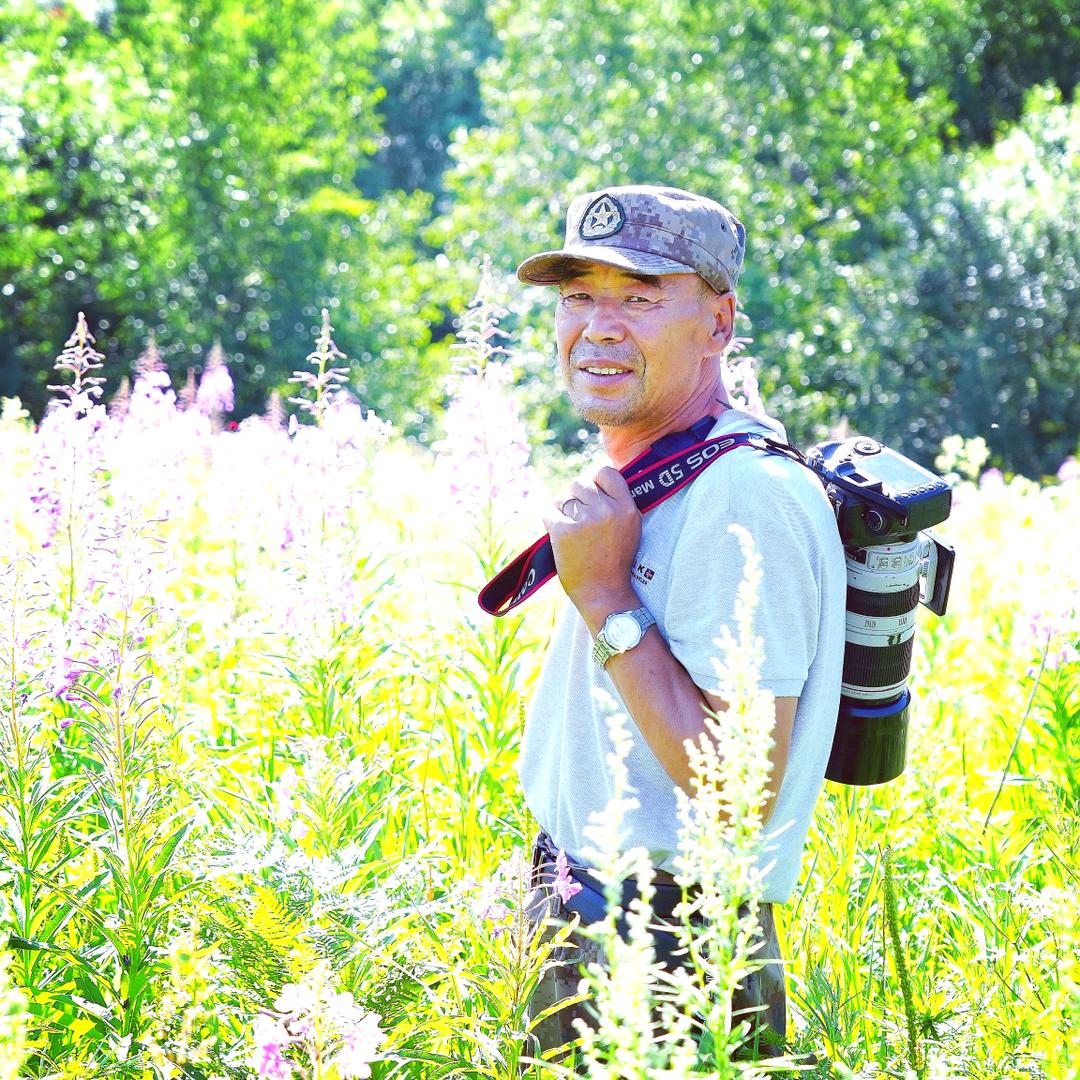 森林摄影爱好者龙殿友