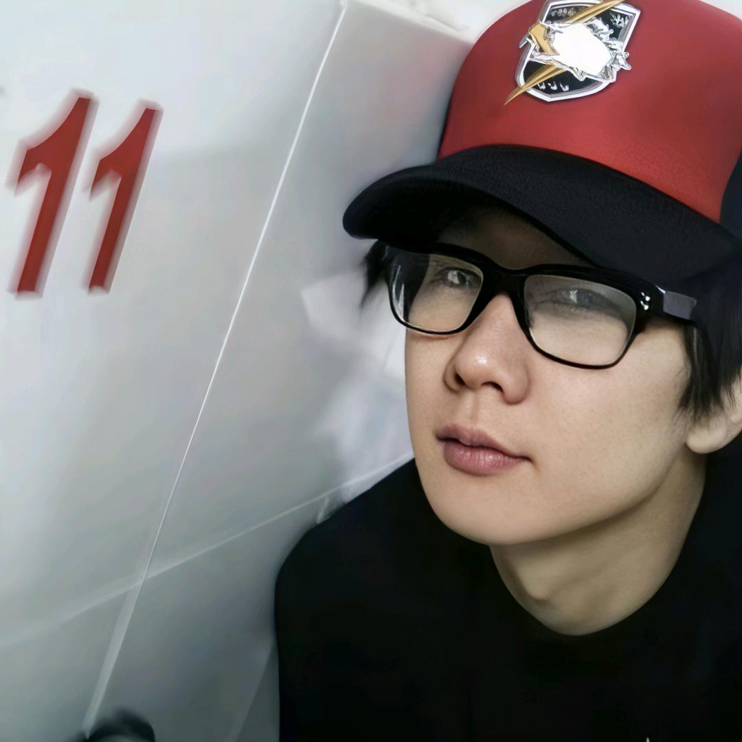 J.