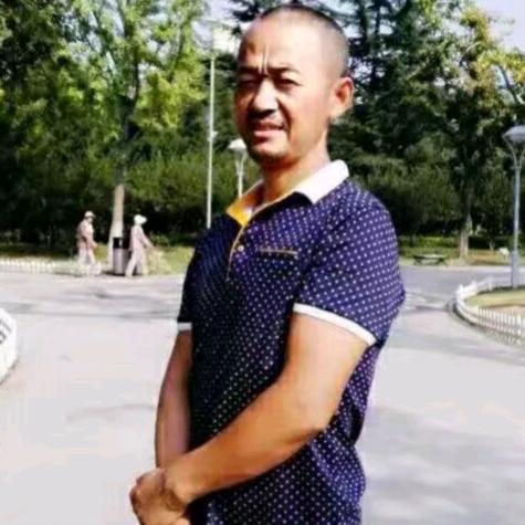 老张