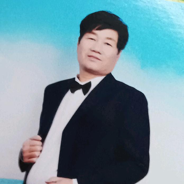 老何