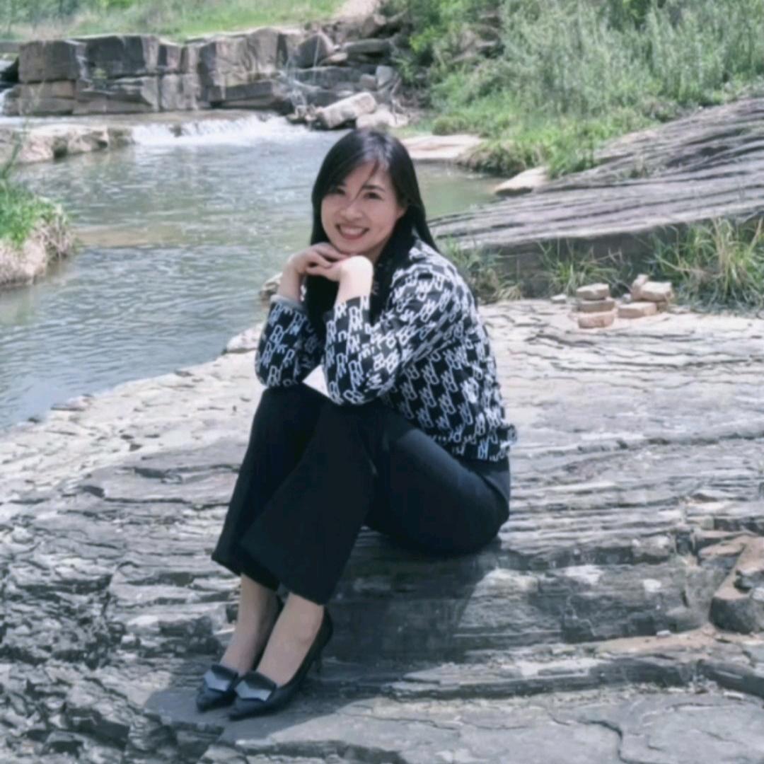 梁女士
