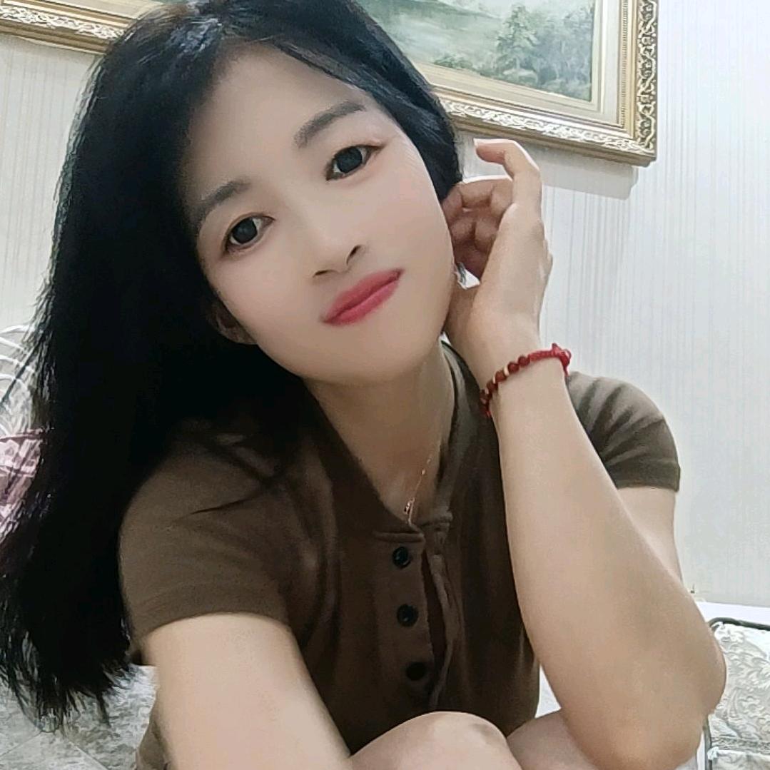 嫣然