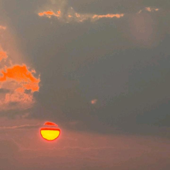 日落归山海意难平