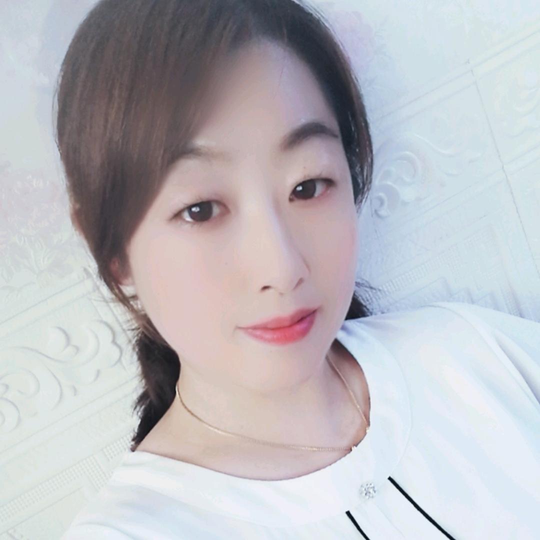 嫣然