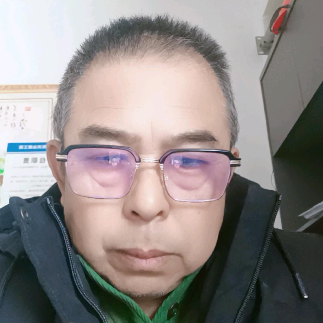 贺传明