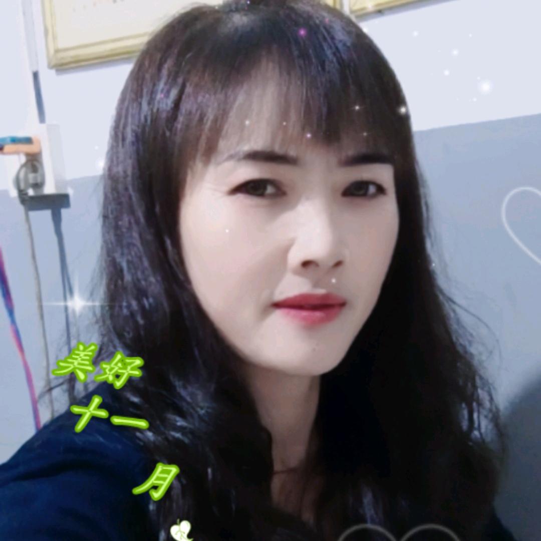 劉