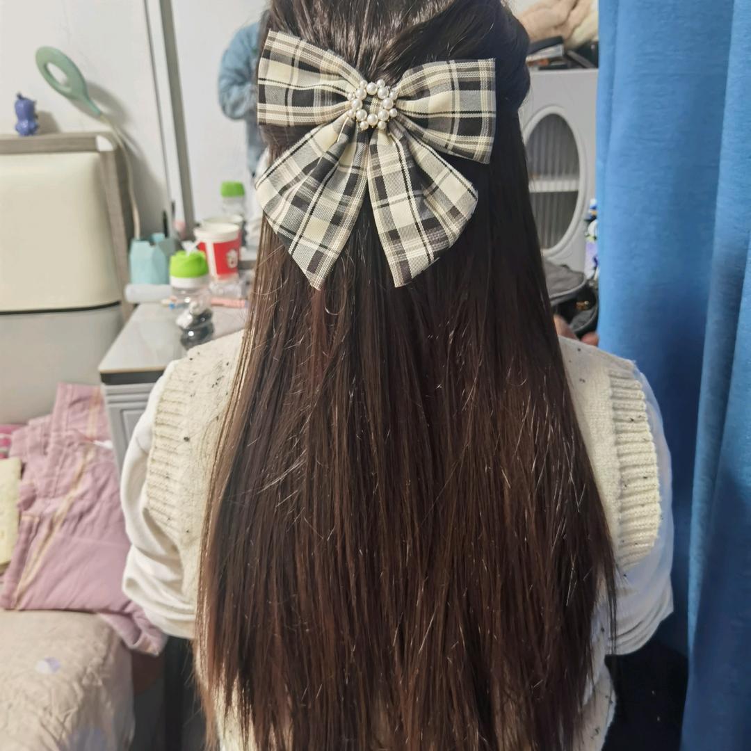 嫣然