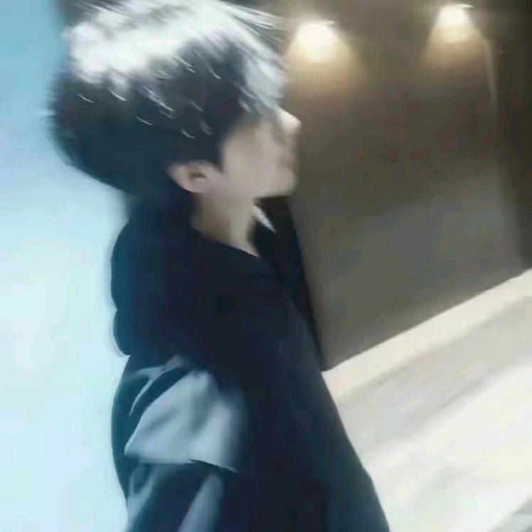 J.