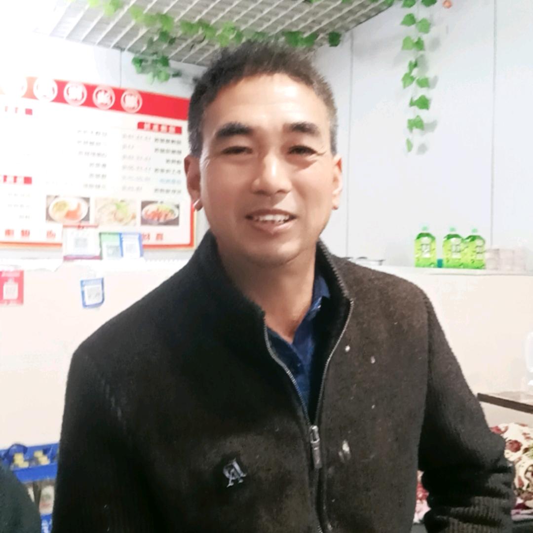 光彩修摩托车老刘