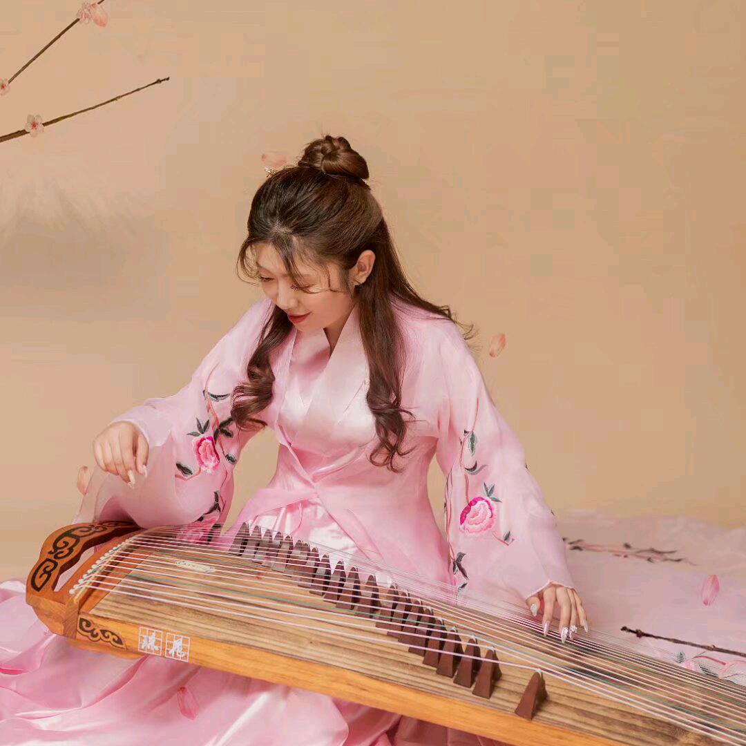 佳谊爱弹筝~