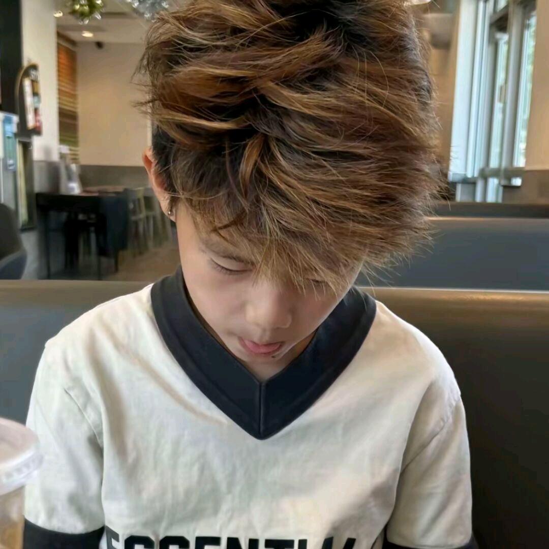 J.