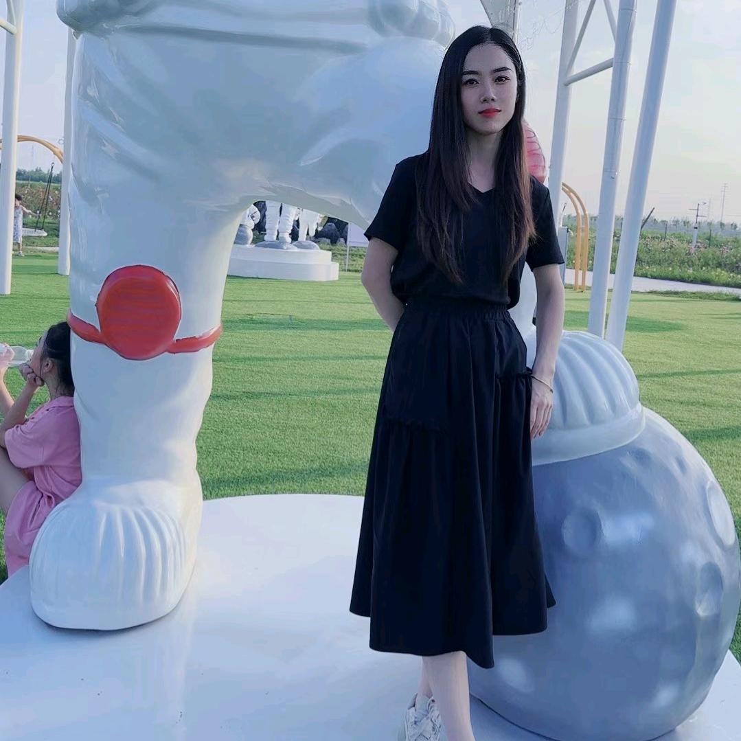 张得美~