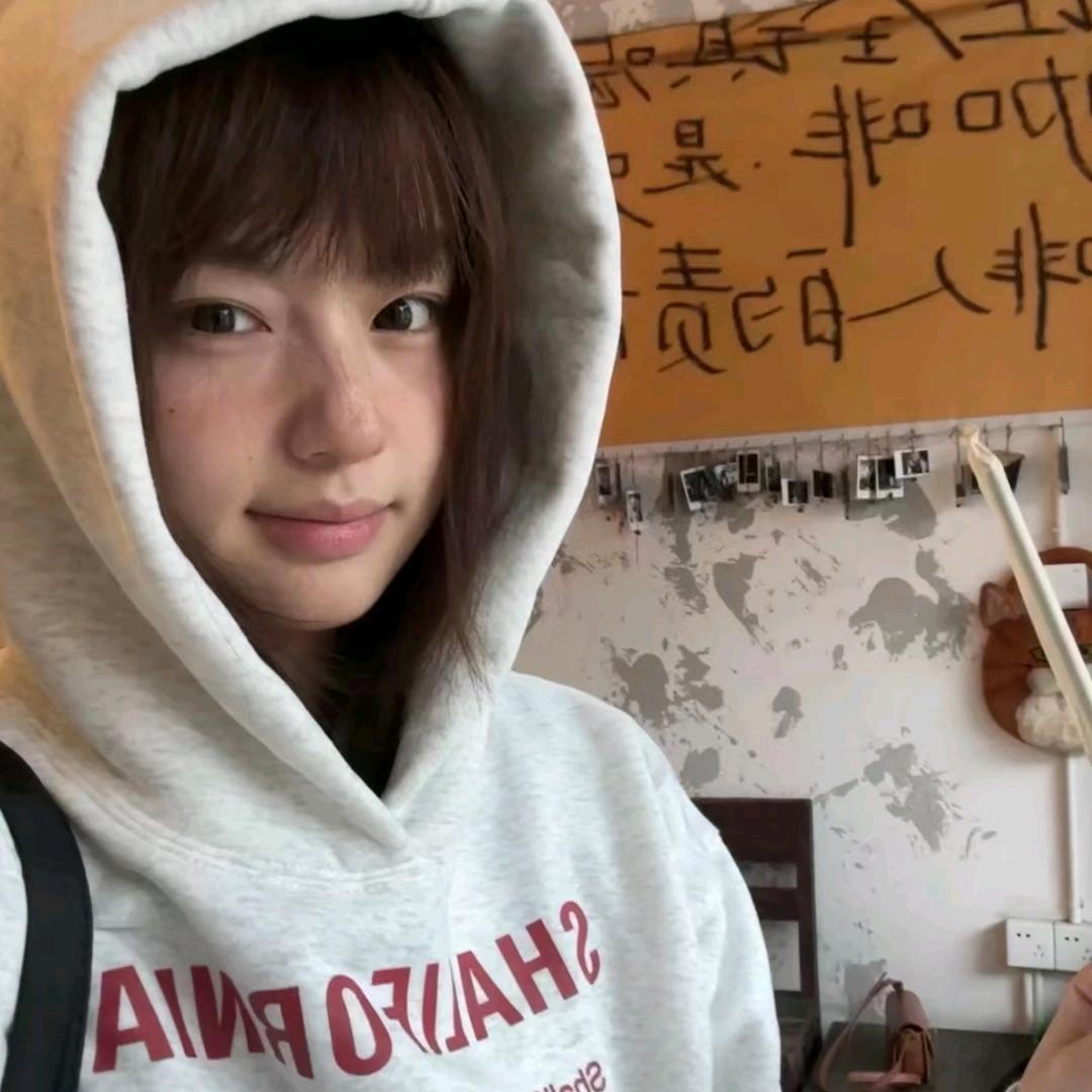 77^