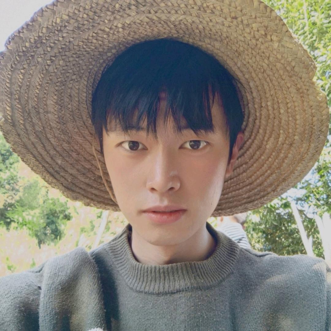 草帽村长小李（大理旅居）