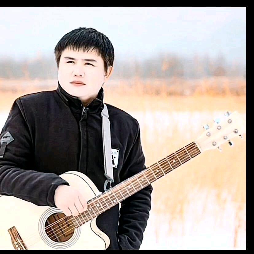 木萨别克 。吾布力