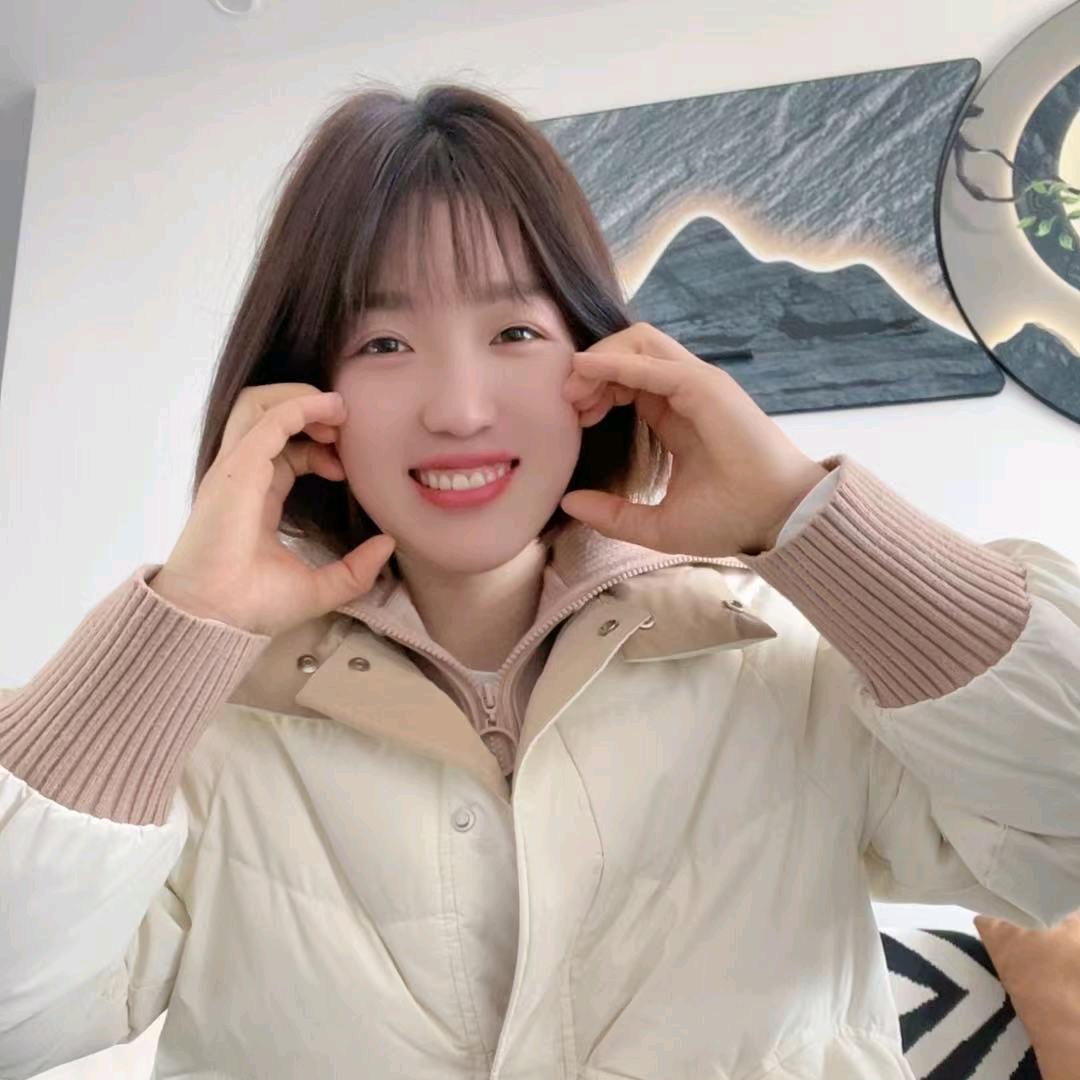 顾 她 °