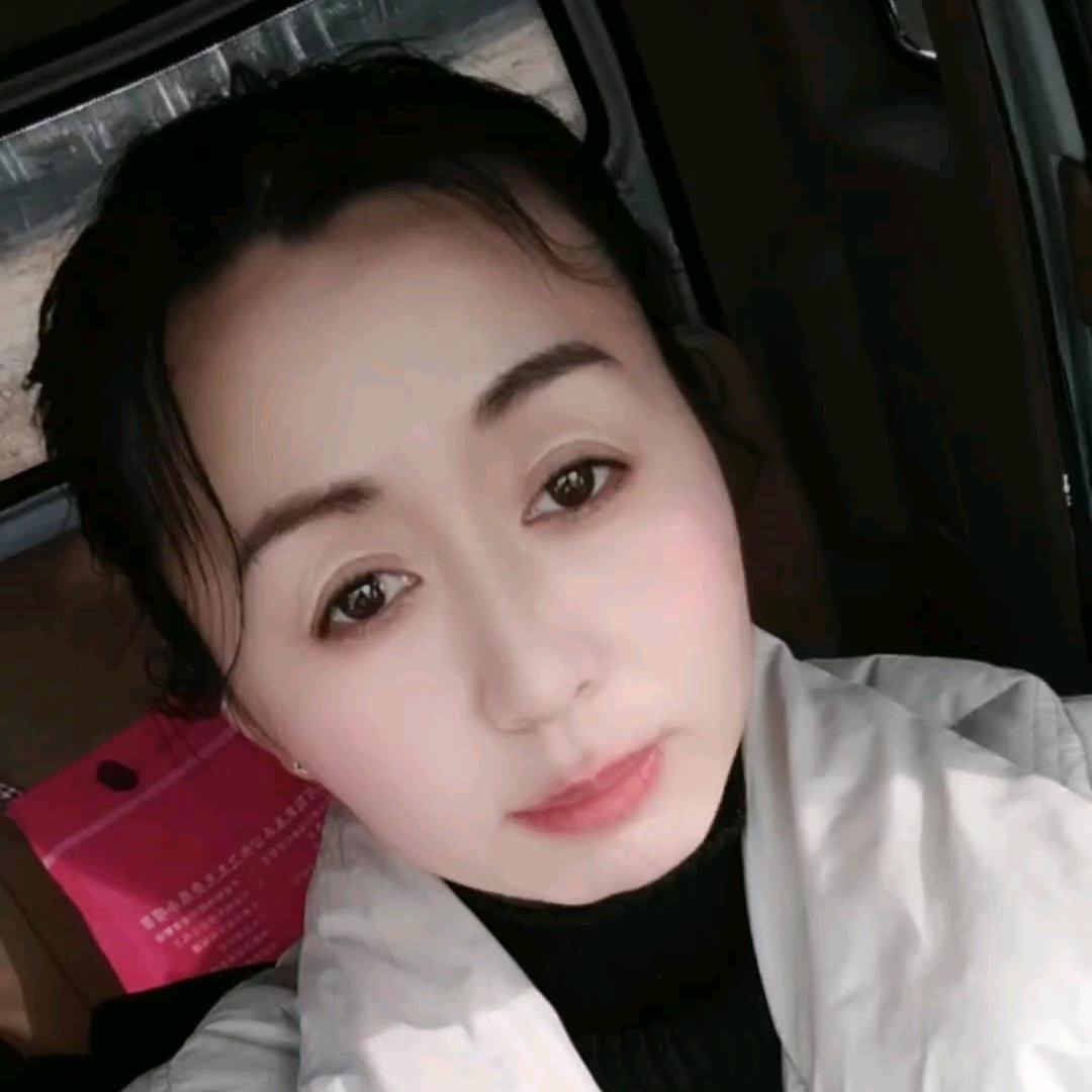 夕雅  (一个负重前行的女人)