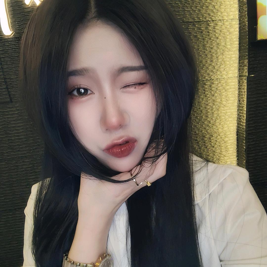 七七