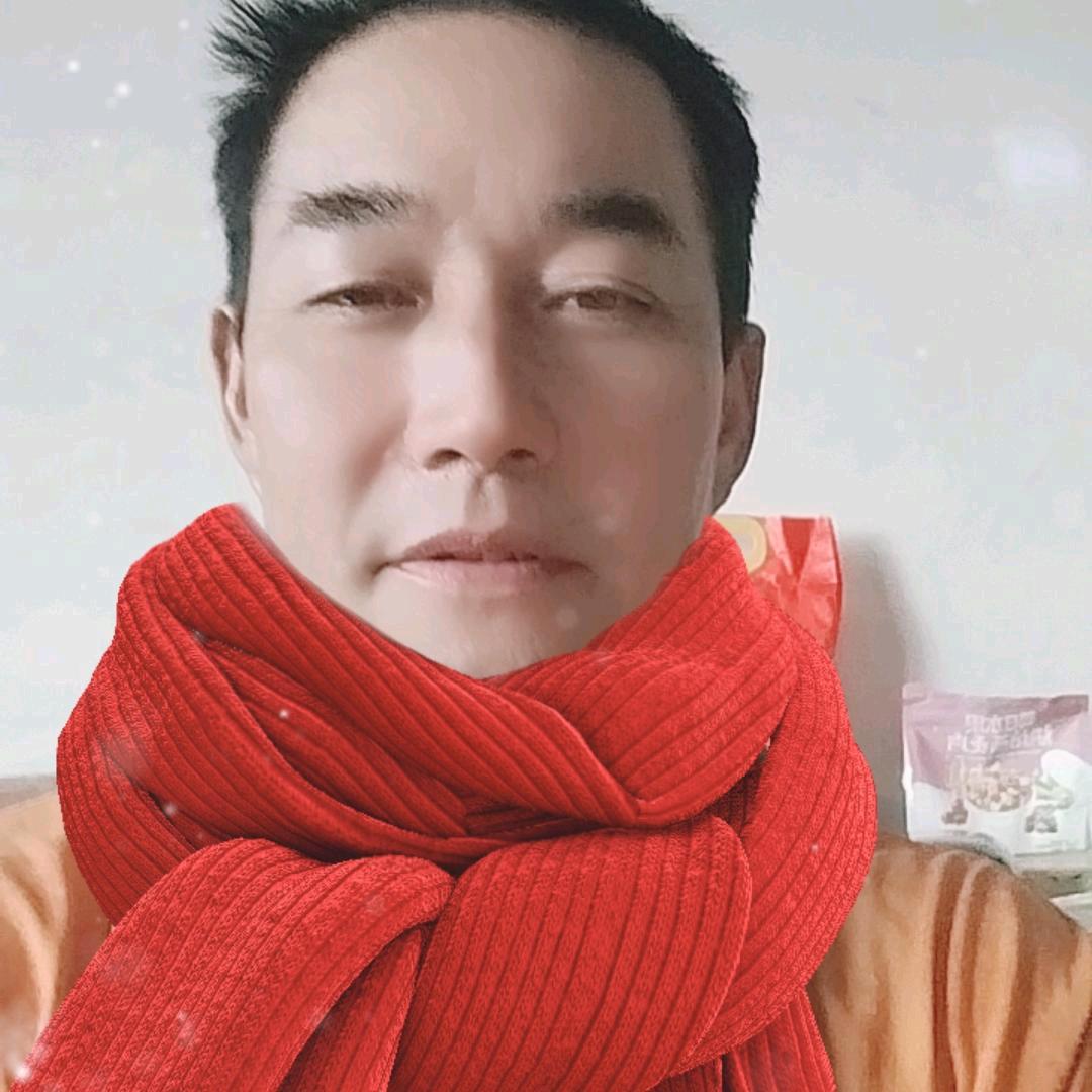 梁君明