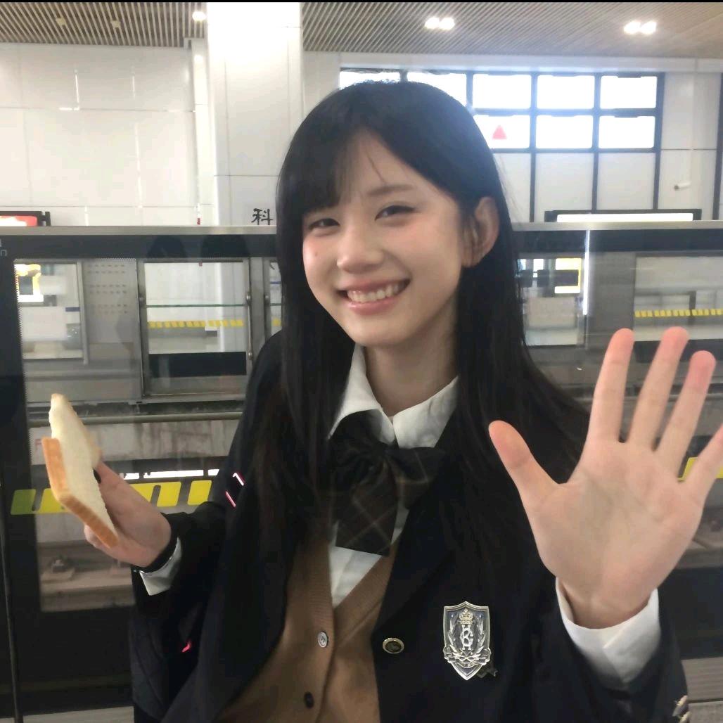 綺^