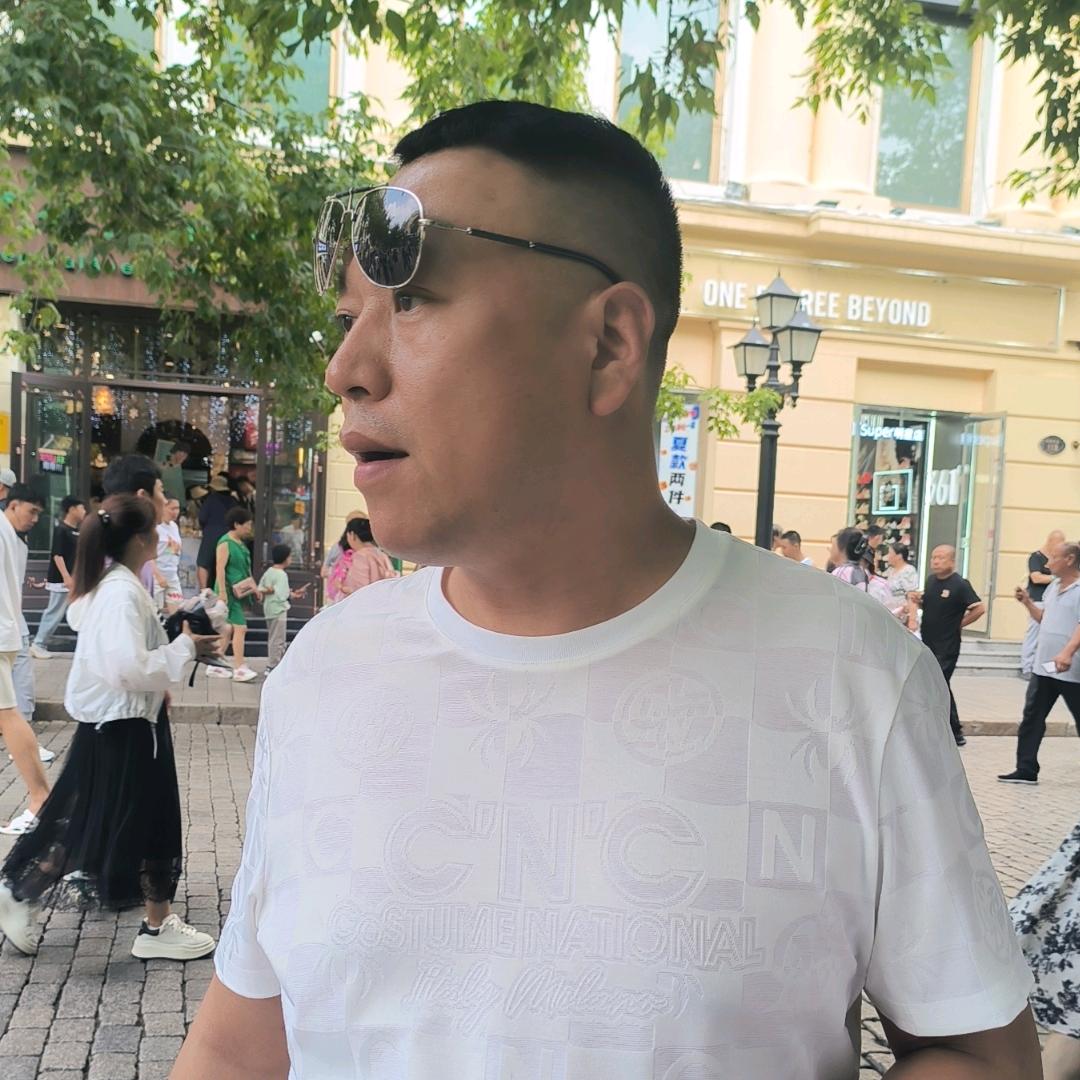 老张