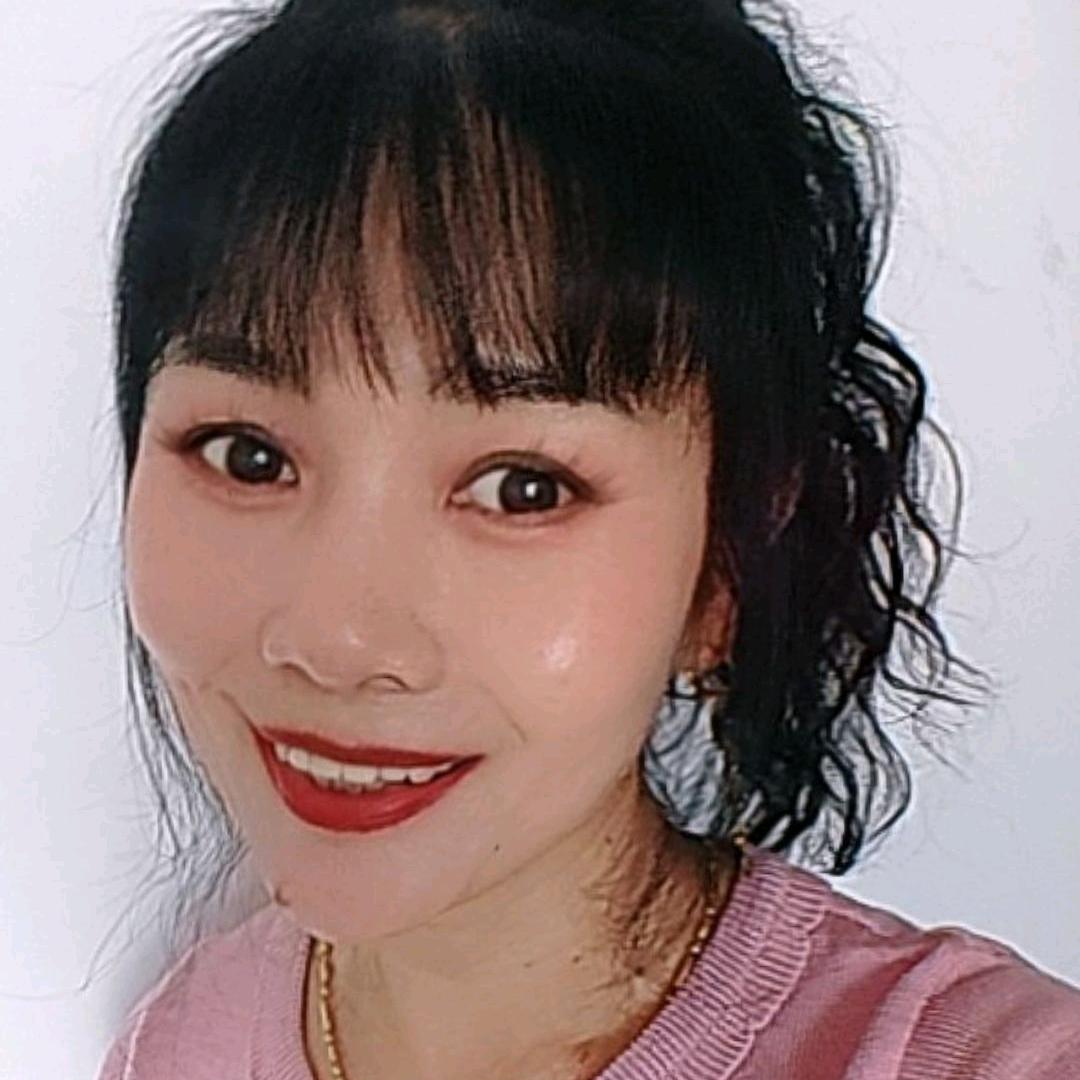 嫣然