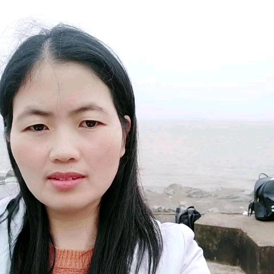 淡然一笑