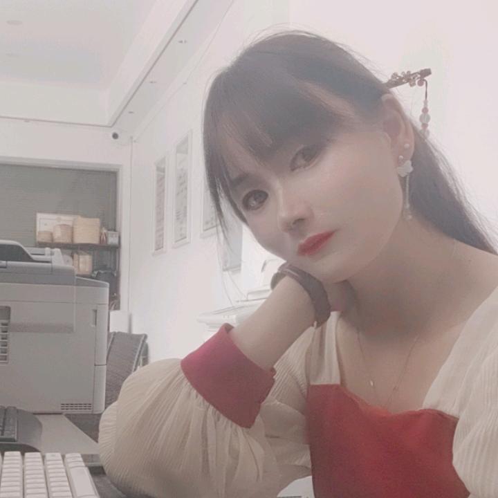 一笑优伤