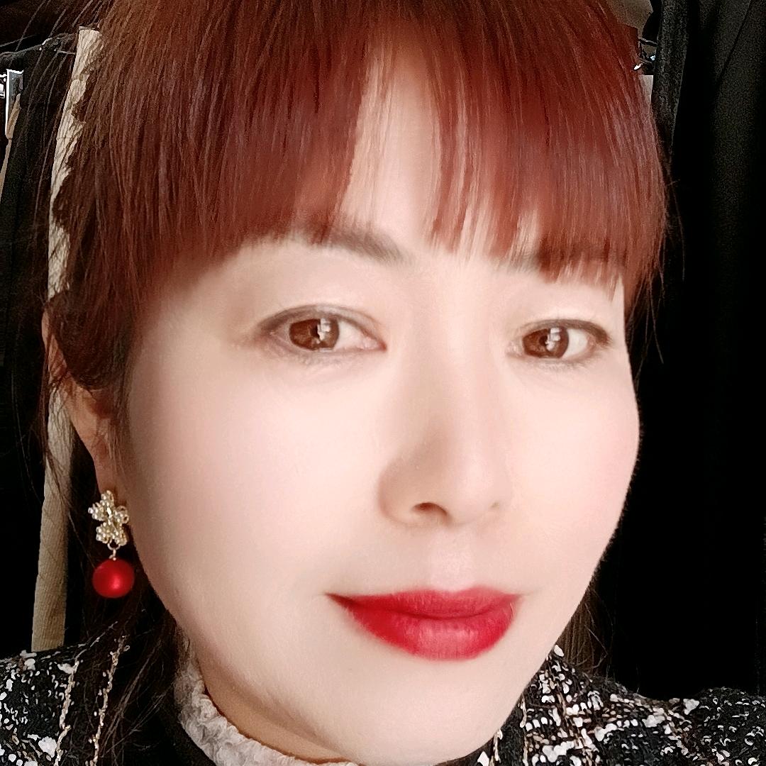 董美心