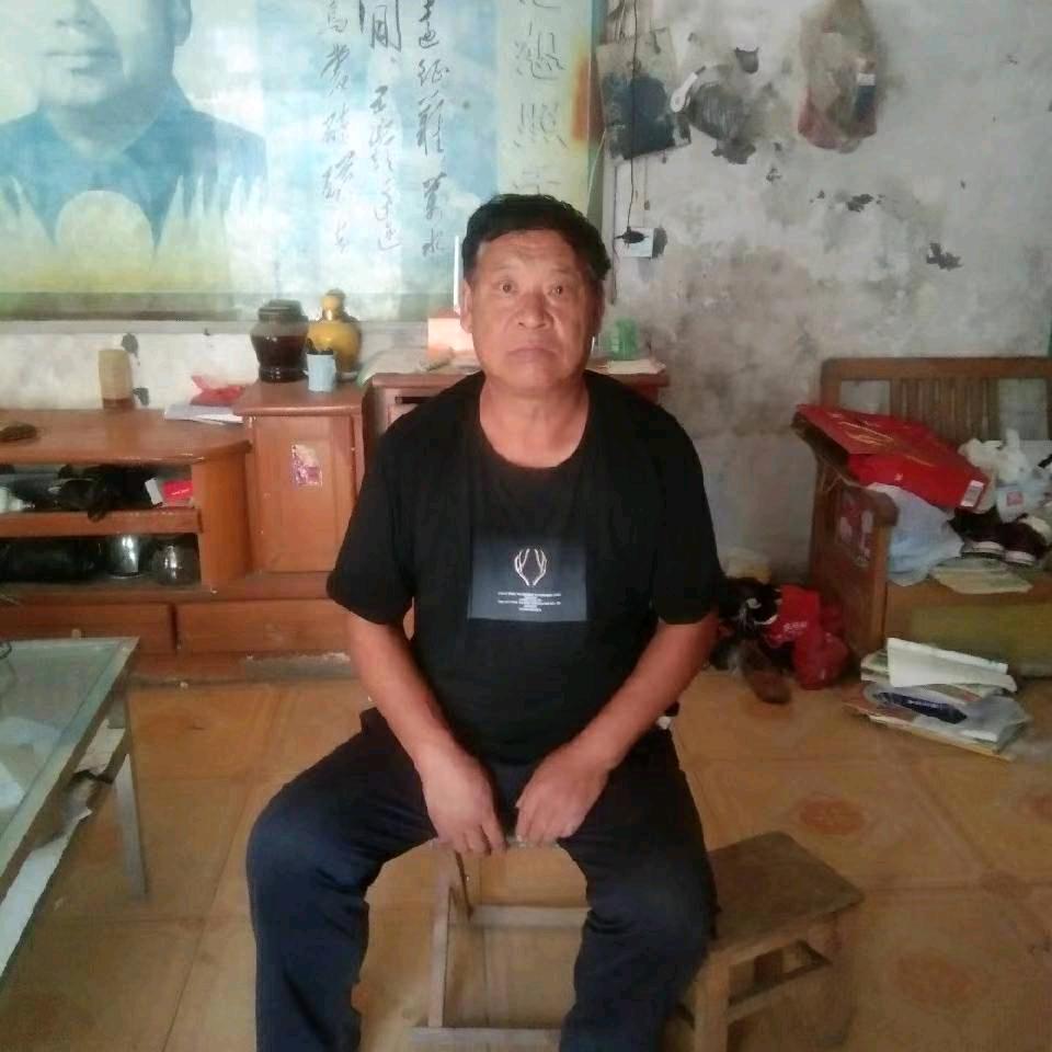 买猪老张