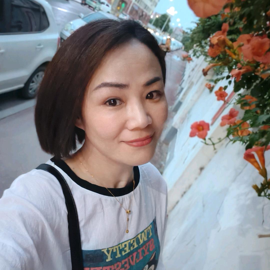 桃花依旧笑春风