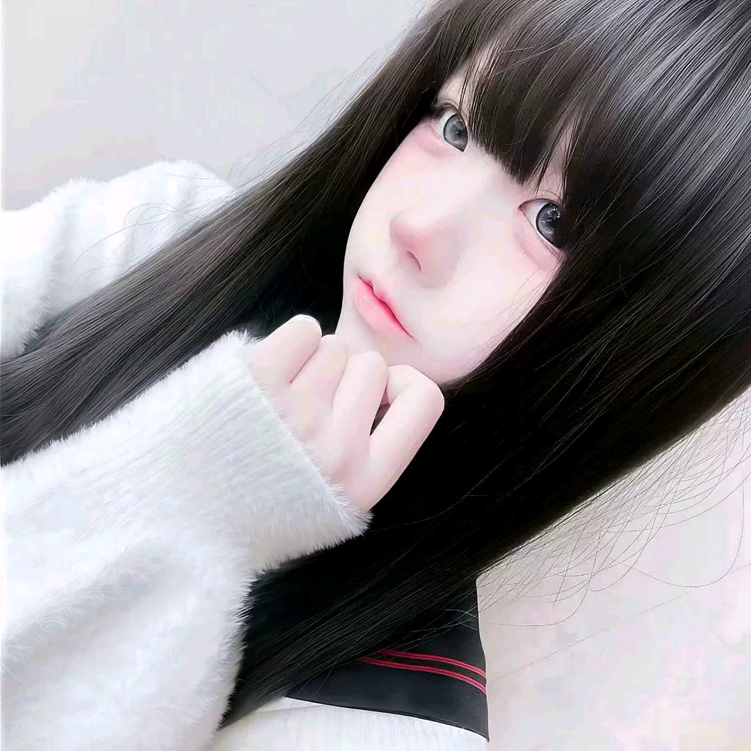 柒柒.