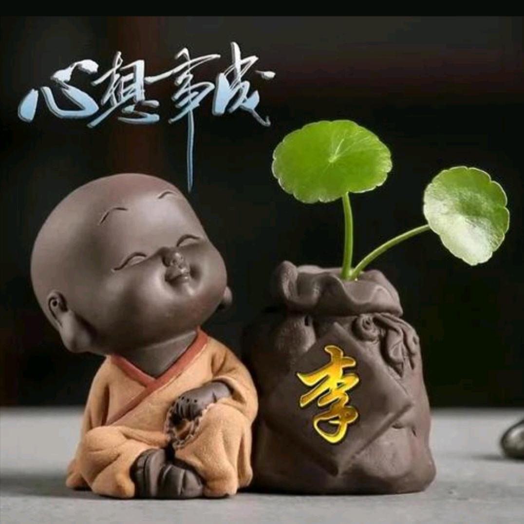 伟.