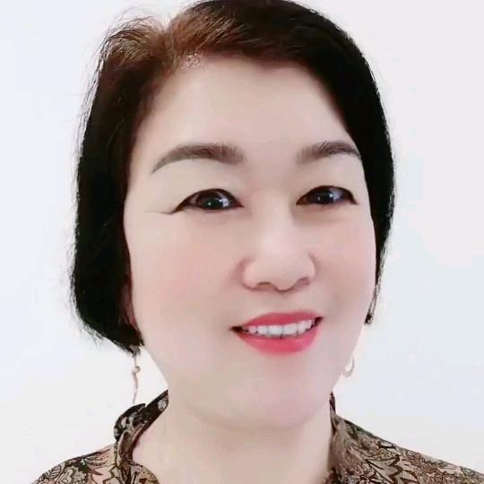 依然笑.