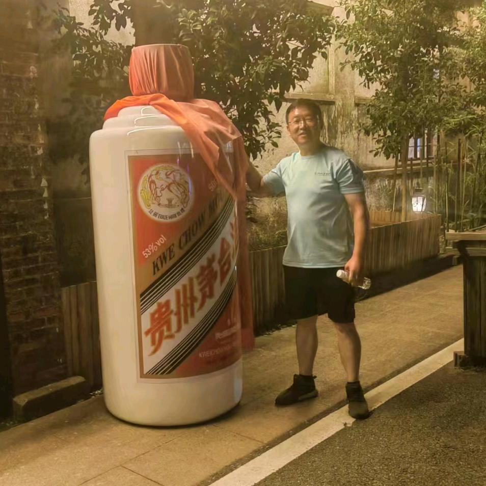 钮会