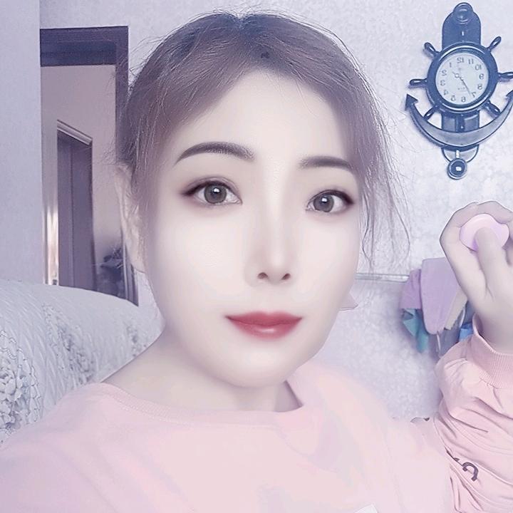 嫣然