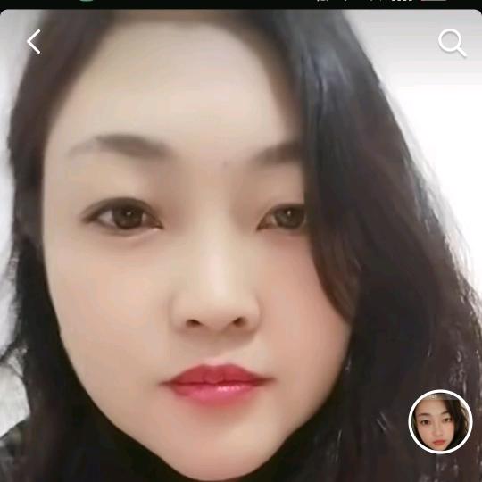 淡然一笑