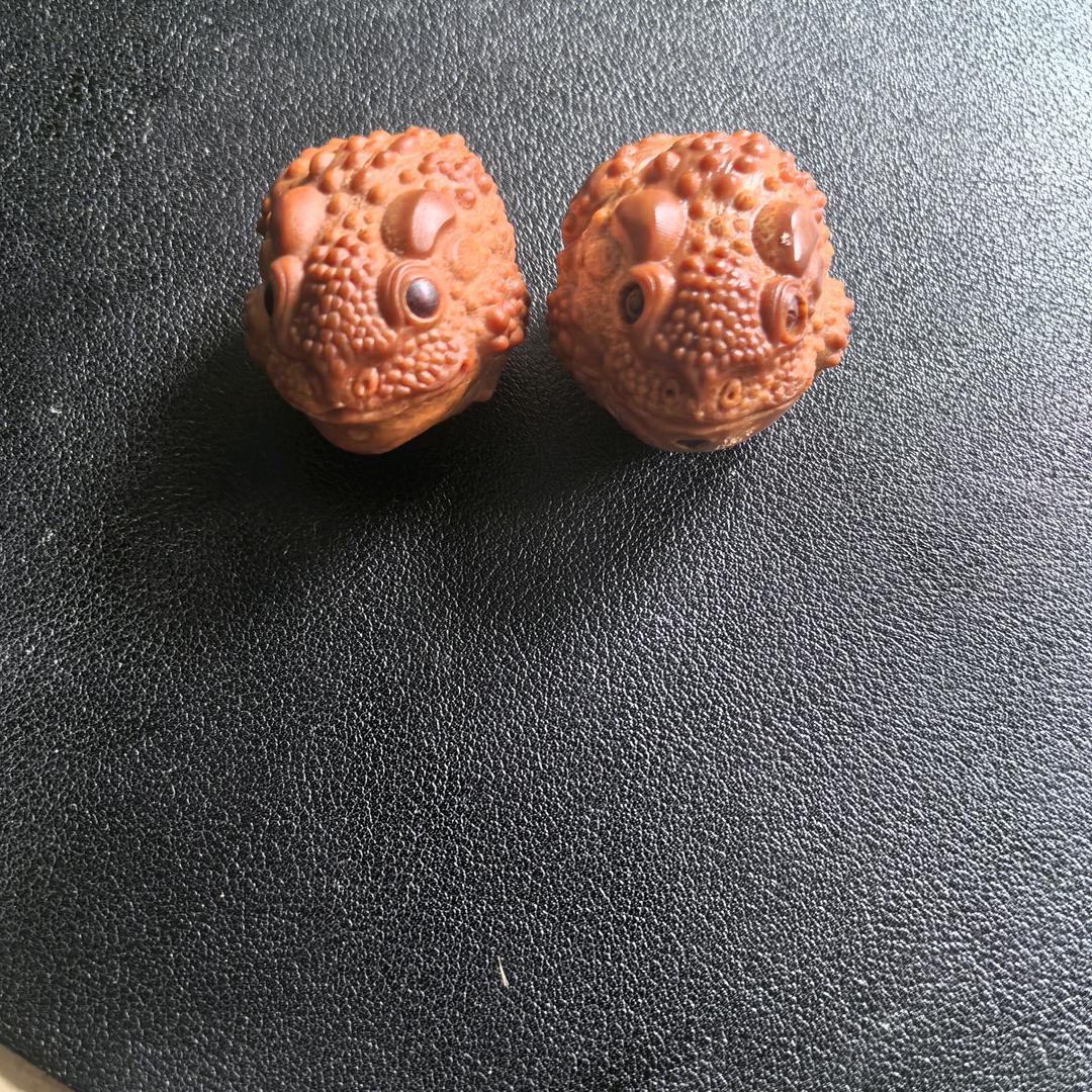 范橄榄核文玩手把件