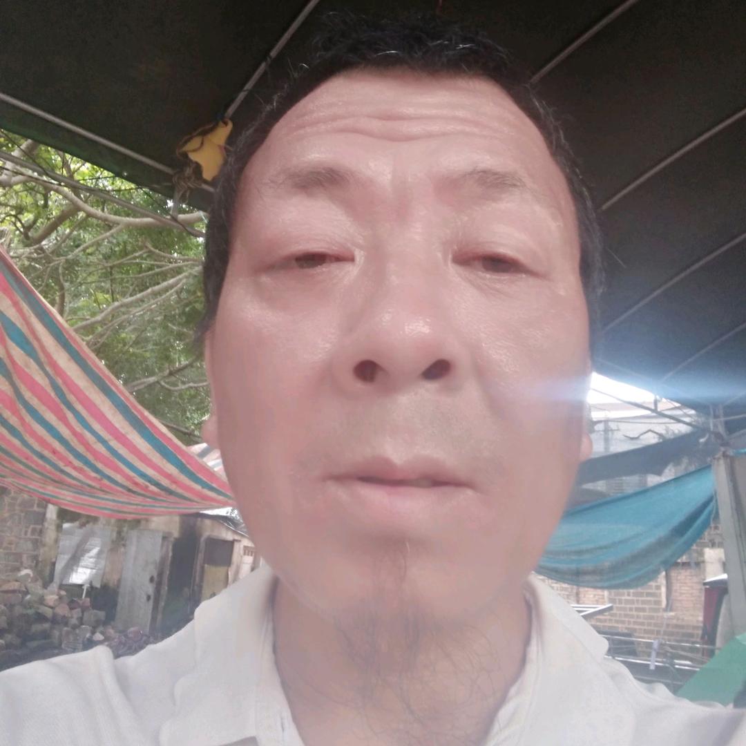 修贵
