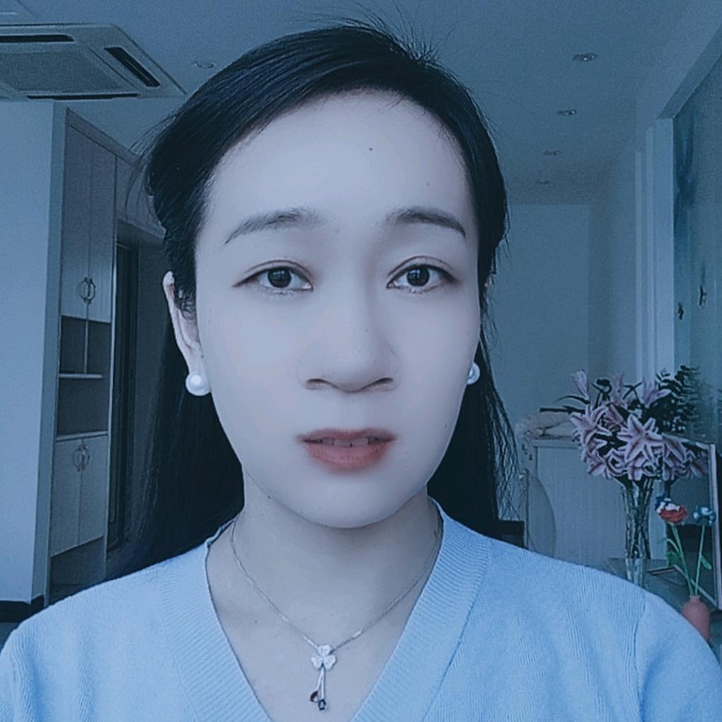 嫣然
