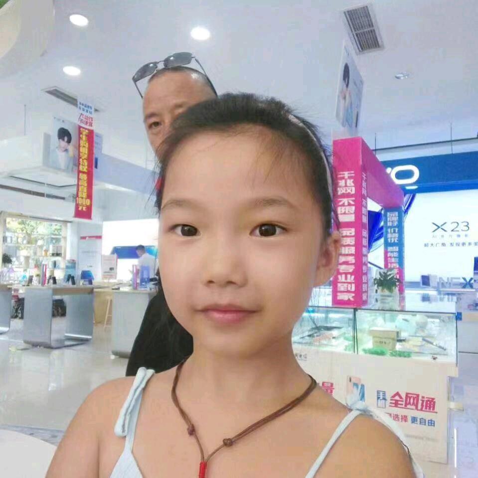 覃英