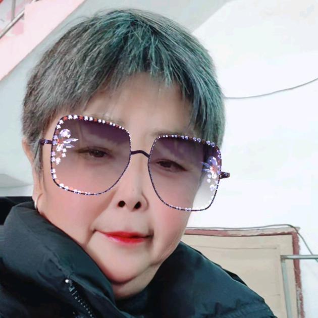 梁群英