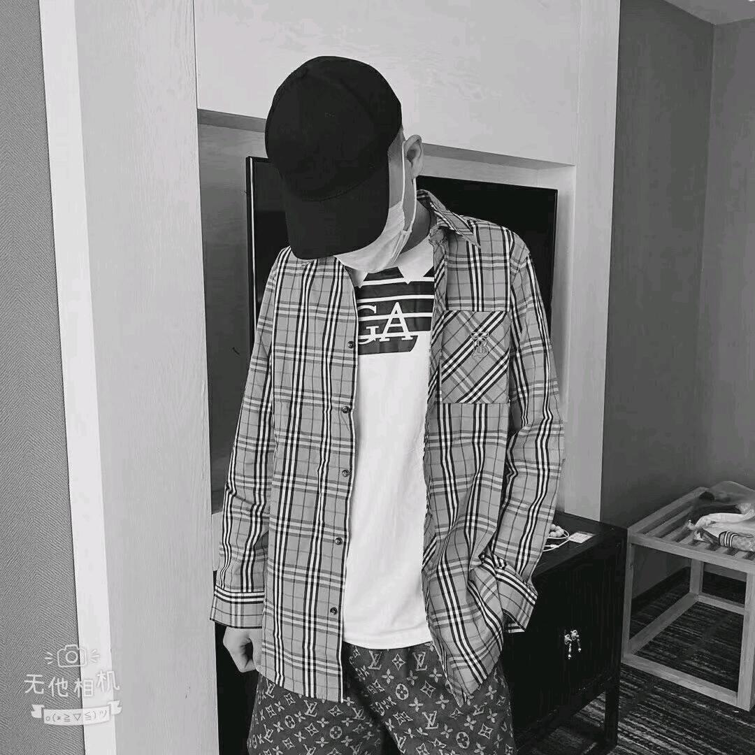 張..