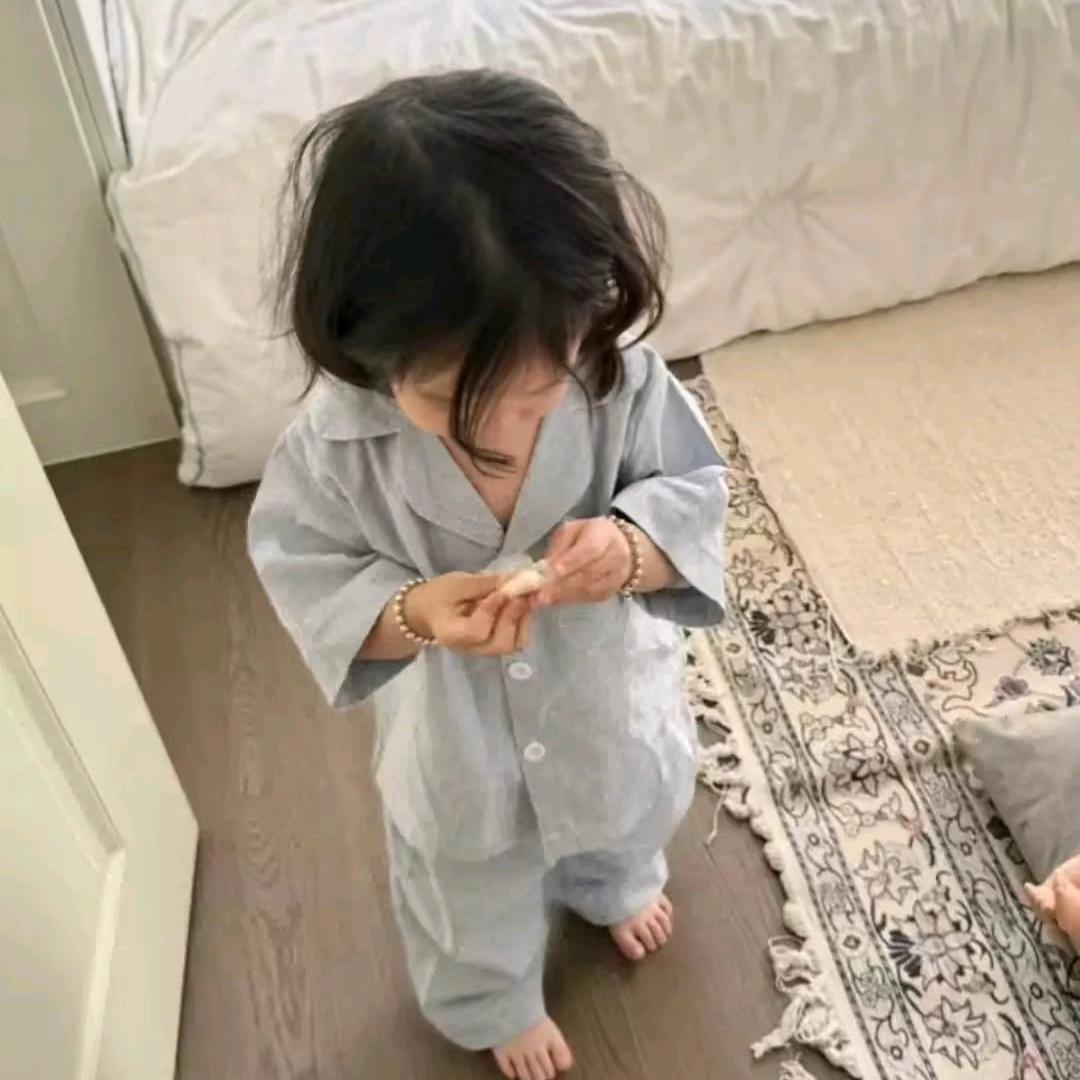 七七