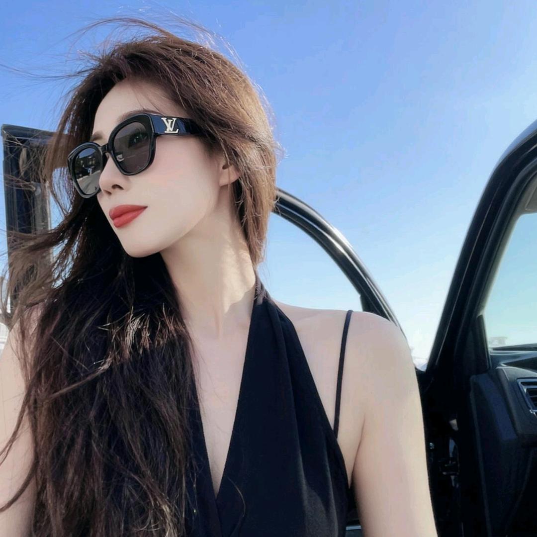 @丽