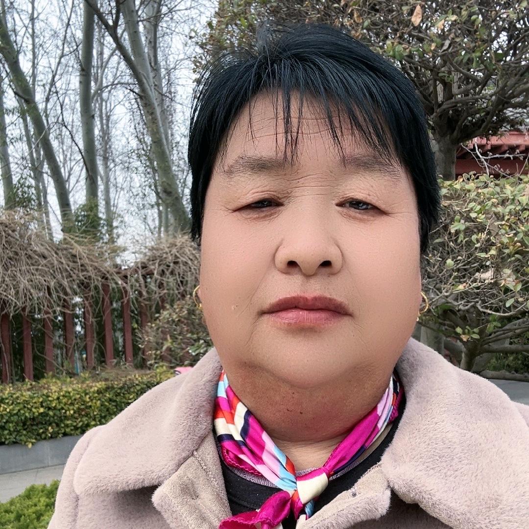 陈*