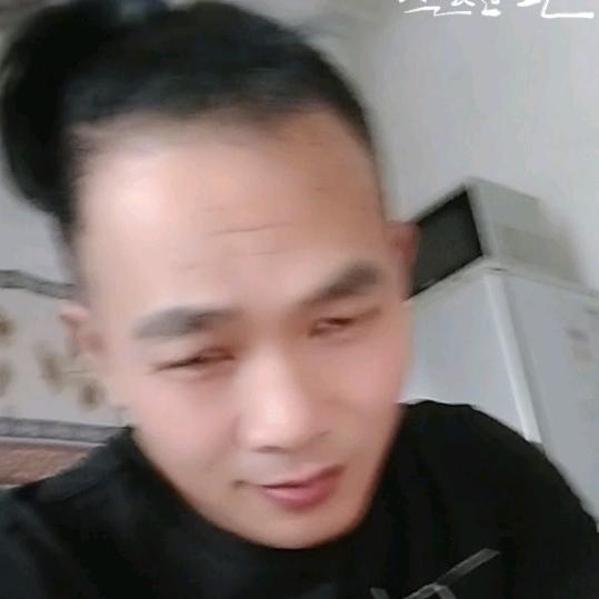 张哥。