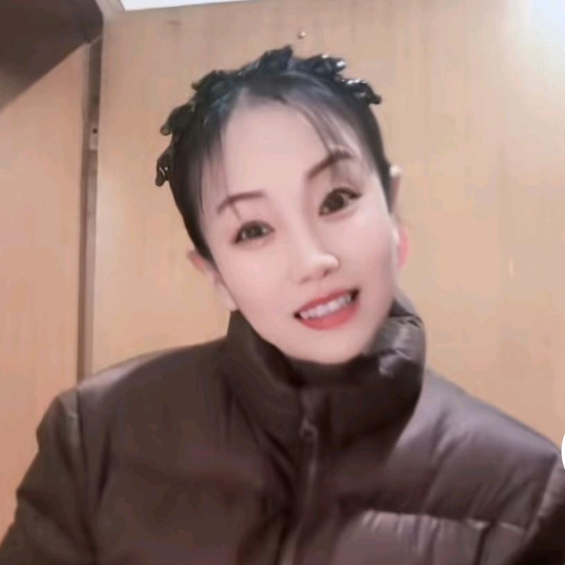 咪咪笑了