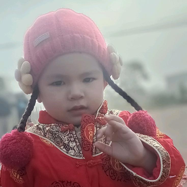 罗