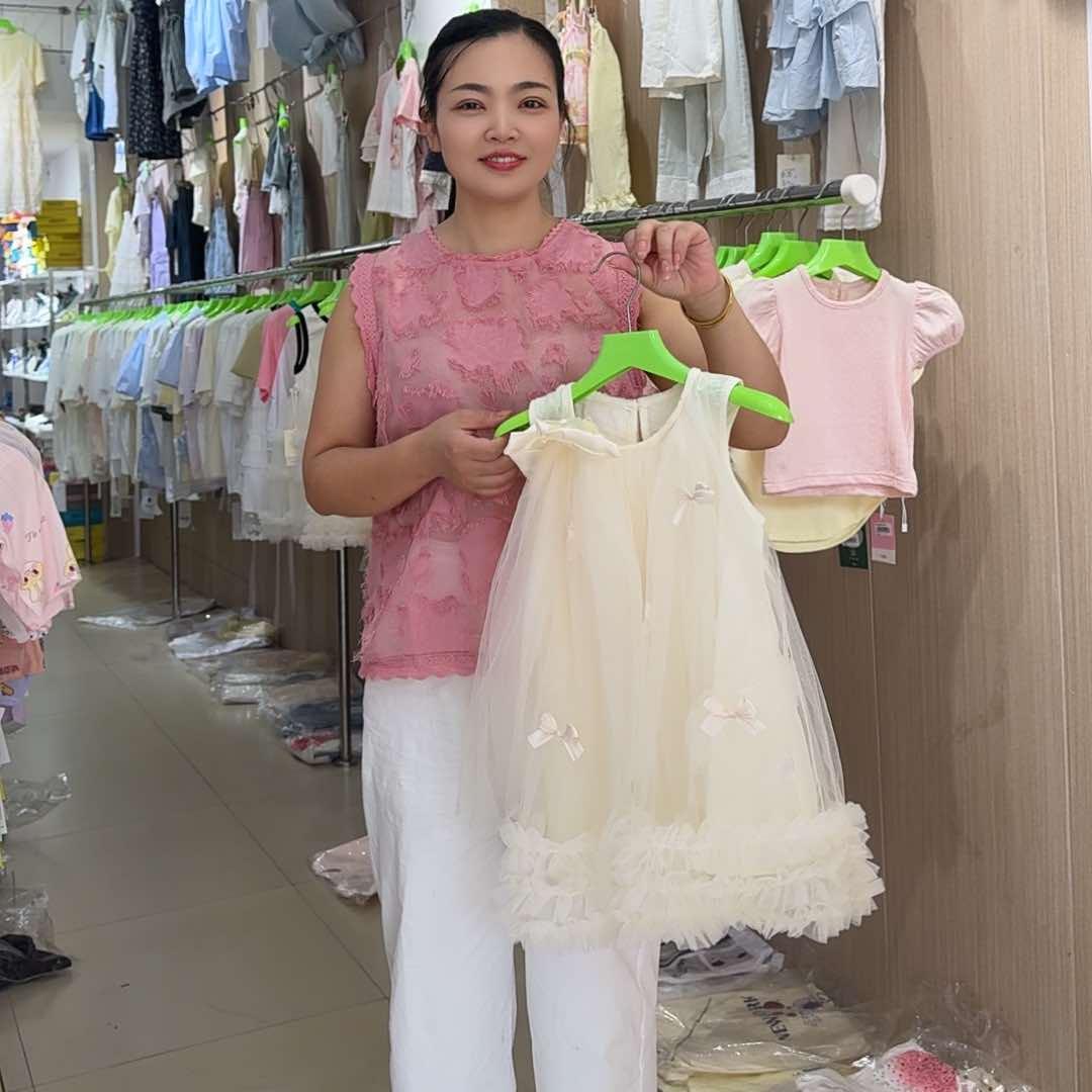 新桥河心怡童装